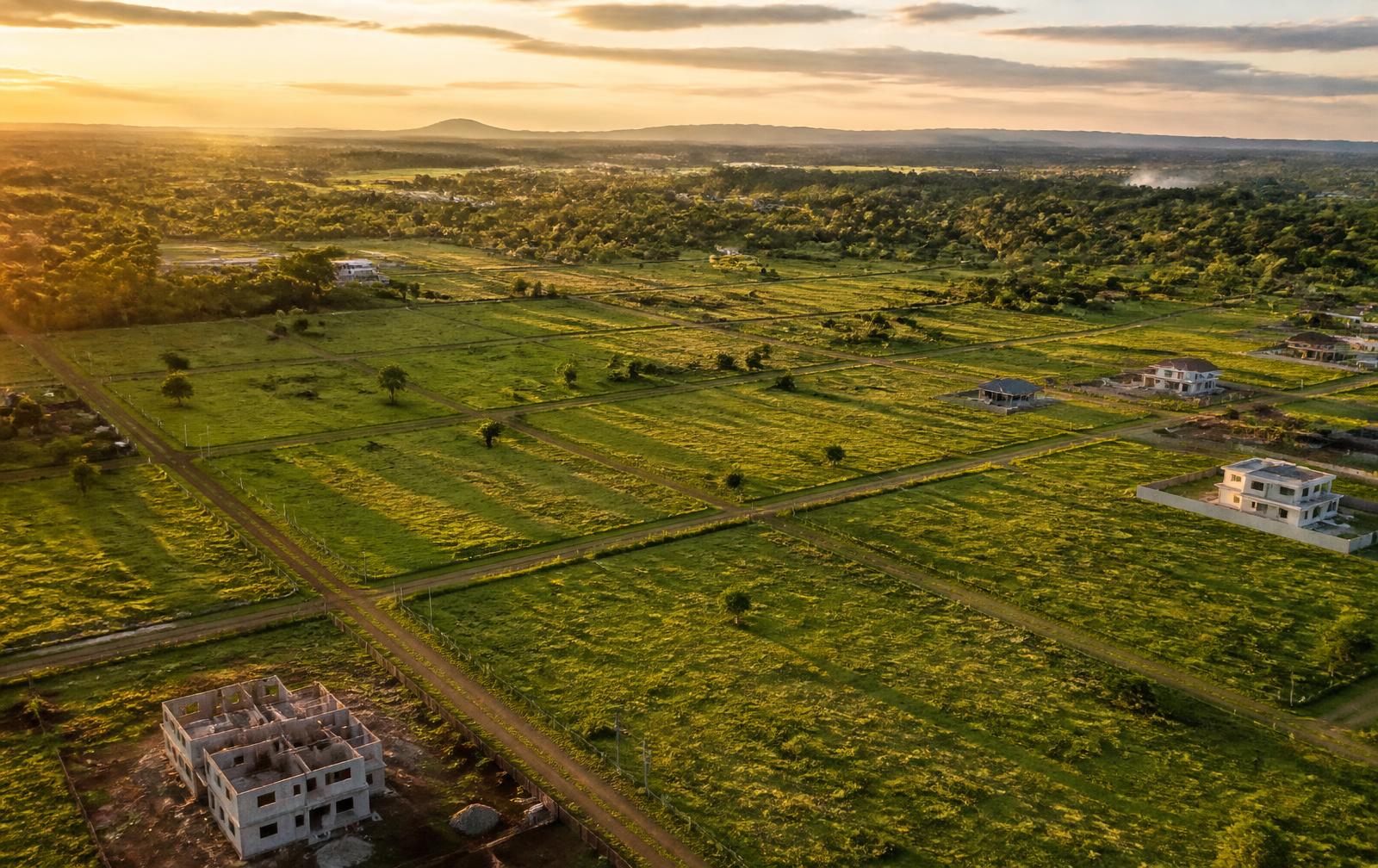 Aerial view of surveyed residential land plots on the outskirts of Eldoret at golden hour